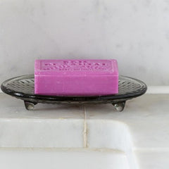 Marseilles Soap Sandal pictured on a glass soap dish