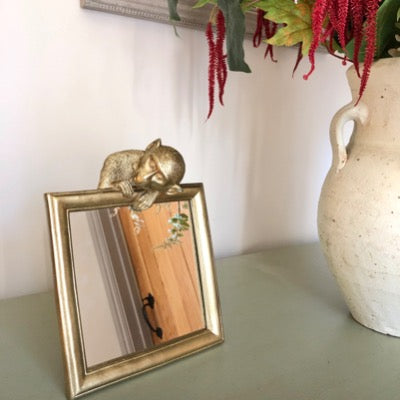 Gold Table Monkey Mirror, Glass with gold resin Fram and monkey peeking over the top