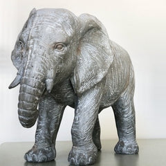 Antique grey elephant sculpture