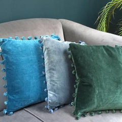 Green Velvet Cushion with Pom Poms