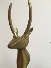 contemporary brass stag figurine on base
