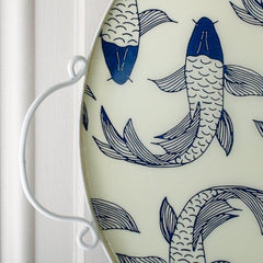 Close up of the White & Cream with Blue Koi Fish round tray